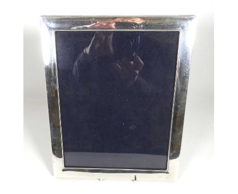 An Elizabeth II Carr's silver-clad easel photograph frame, of rectangular shape, 25 x 20cm