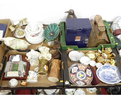 Four boxes of various items to include a majolica comport bowl, a model of Arsenal football stadium, Imari plates, and a Frit