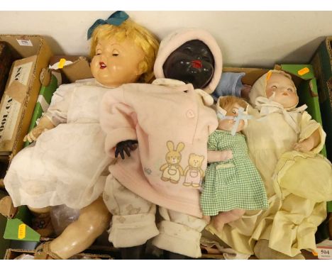 A collection of 20th century dolls to include bisque head example