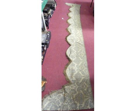 A collection of Victorian embroidered curtains and pelmets.