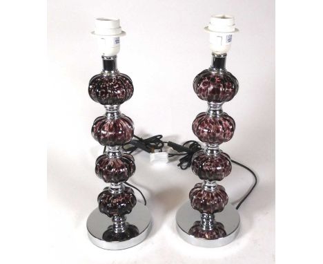 A pair of contemporary mottled glass and chromed metal table lamps, by där Lighting, h.44cm