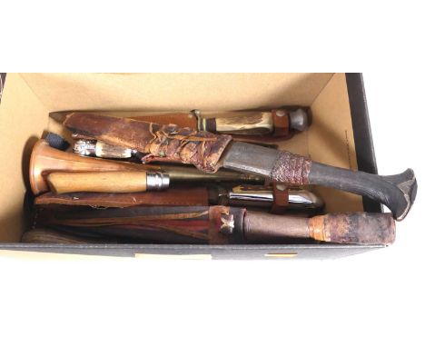 A collection of knives to include horn handled hunting knives, and an Opinel No. 8 pocket knife