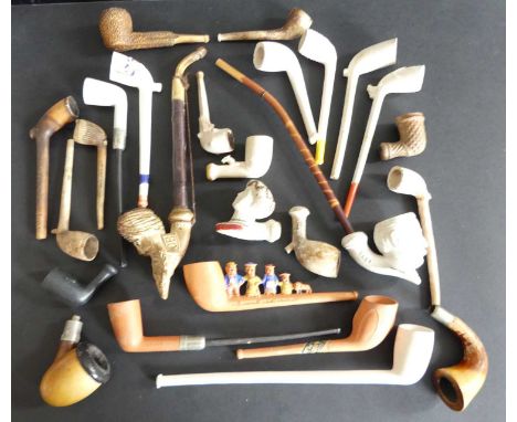 A 19th Century Pipe by Gambier, Paris, France, depicting Taft numbered 1684, together with various clay pipes and bowls. (25)