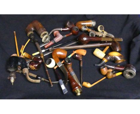 Assorted pipes including a carved wooden stove pipe, various Estate pipes, Long stemed pipes, Continental, amber and a White 
