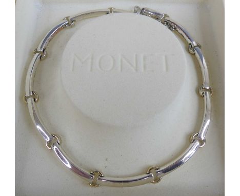 A Monet polished metal sectional choker, in original box