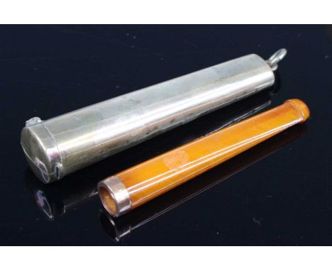 A Victorian cheroot holder, having an amber mouthpiece and 9 carat gold mount, sponsor H.C., London, 1859, housed in an assoc