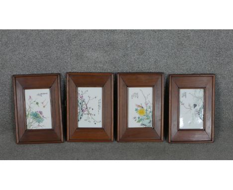 Four framed 19th century Chinese hand painted porcelain tiles, each depicting a different flower and insect. Each with artist