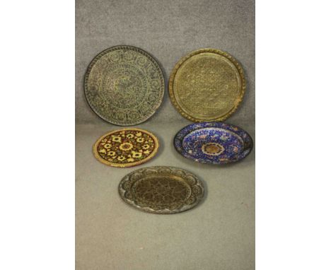 A collection of five 19th century ceramic and metalwork plates and trays. A Canton enamel Chinese charger with lucky bats, pe