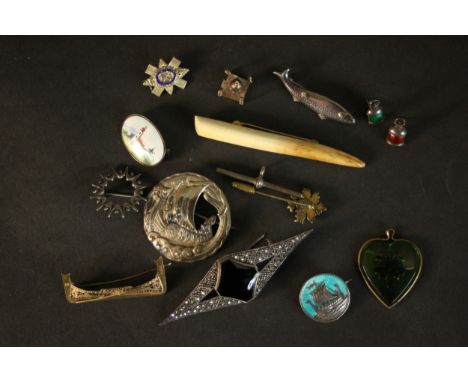 A collection of silver jewellery, including various Danish silver brooches, a taj mahal charm, pair silver and enamel lantern