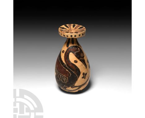 7th century B.C. A Corinthian black-figure piriform alabastron with broad mouth, possibly by the Brussels painter, pierced lu