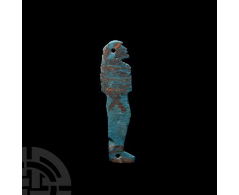 Late Period, circa 500 B.C. A blue-glazed composition amulet formed as baboon-headed Hapi with stylised detailing to one face