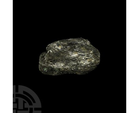 A substantial specimen of green emerald crystals in biotite mica matrix; supplied in a cardboard specimen tray. 680 grams, 15