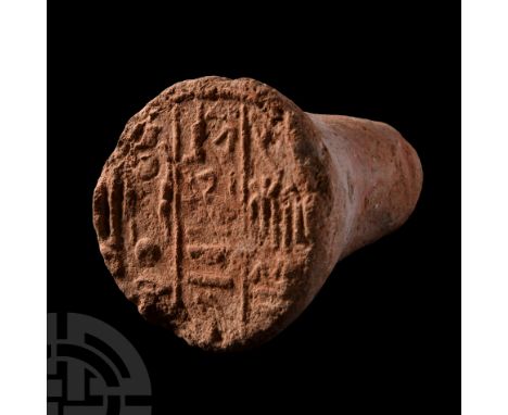 New Kingdom, 18th Dynasty, reign of Amenhotep III, circa 1410 -1372 B.C. A funerary cone bearing hieroglyphs in raised relief