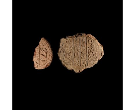 26th Dynasty, circa 648 B.C. A fragment of the right side of a funerary cone, originally bearing two columns of hieroglyphs f