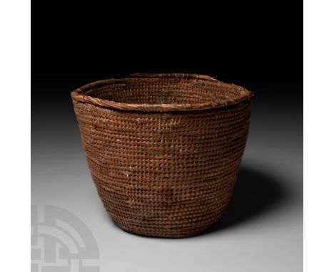 New Kingdom, 18th Dynasty, circa 1569-1315 B.C. A neat, tight weave, palm leaf or halfa grass coiled and woven basket, compos