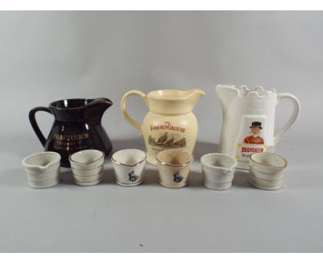 A Set of Six Ceramic Drip Trays and Three Advertising Jugs for Famous Grouse, Beefeater and Teacher's Whisky. 