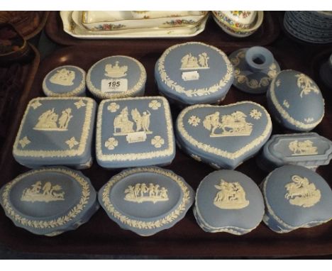 A Tray Containing Twelve Wedgwood Blue Jasperware Lidded Boxes and A Candle Stick. 