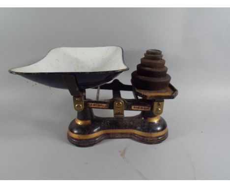 A Set of Kitchen Scales and Weights by C W Brecknell. 