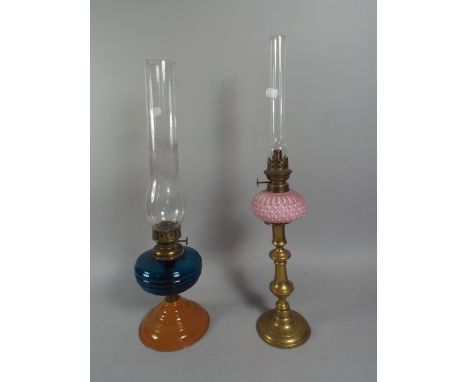 Two Victorian Oil Lamps One Formed From Brass Candle Stick with Glass Reservoir The Other with Blue Glass Reservoir. 