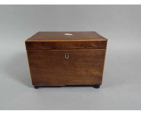 A Mid 19th Century Mahogany Tea Caddy Box Having Boxwood Stringing.