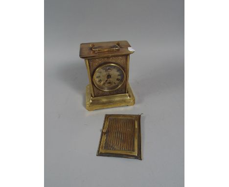 An American Brass Carriage Clock (In Need of Attention). 