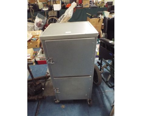 A Vintage Metal Two Cupboard Trolley. 