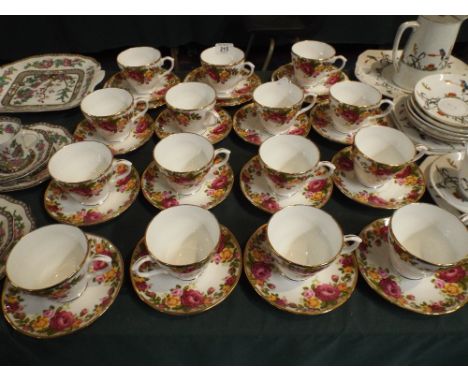 A Rose Patterned Collection of Tea Wares to Include Fifteen Cups and Saucers and Three Side Plates. 