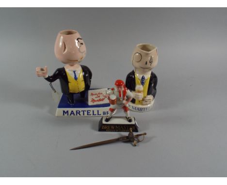 A Carlton Ware Ceramic Martell Brandy Advertising Stand, Jug and Brew Master Figure. (af)