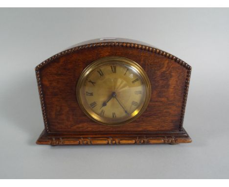 A Small Oak Mantle Clock. 