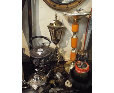 A Collection of Metal Ware to Include Silver Plated Teapot, Silver Plated Sprit Kettle, Brass Table Lamp, Wooden Handled Carv