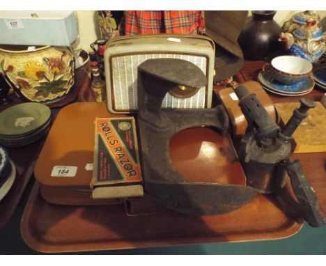 A Tray of Sundries to Include Vintage Radio, Shoe Last, Blow Torch, Rolls Razor, Two Travelling Companion Sets Etc. 