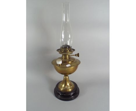 A Victorian Brass Oil Lamp with English Juno Control and Art Nouveau Mouldings to Base. 