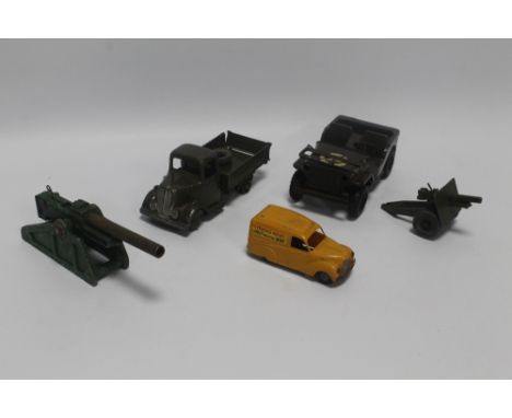 A TRIANG TIN PLATE CLOCK US ARMY JEEP, a Triang Minic friction drive Austin 'Evening News' delivery van, a Britains diecast a