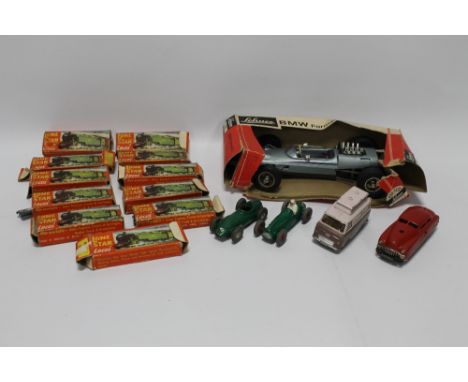 A BOXED SCHUCO TINPLATE FRICTION DRIVE 1072 BMW FORMULA 2, a tinplate clockwork Schuco 3041 varianto - Limo, loose Dinky 233 