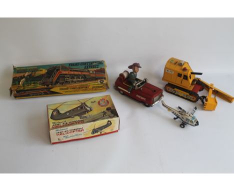 A BOXED MARX MECHANICAL ARMY AIR TRANSPORT HELICOPTER, a boxed Modern Toys tinplate battery operated Trans-Continental Expres