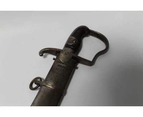 AN EARLY 19TH CENTURY EUROPEAN CAVALRY SABRE, with metal scabbard, marked to blade back 3 - 28 