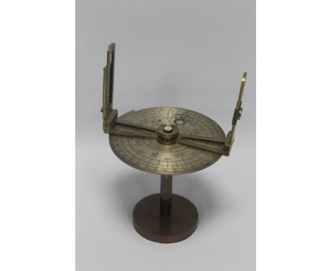 A "J. BRUCE & SONS, LIVERPOOL" PEDESTAL SIGHTING COMPASS, with silvered brass dial & brass stand & fittings. Dial D.16cm