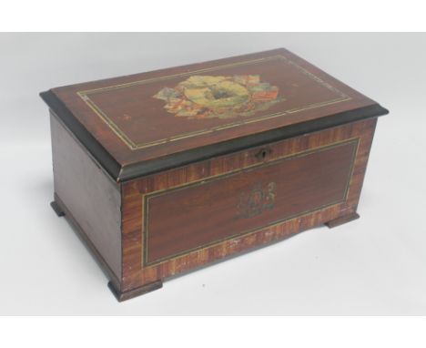 AN EARLY 20TH CENTURY MUSICAL BOX, the lid depicting a dreadnaught with flags, 6¼" drum, playing with three bells with butter