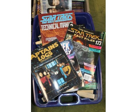 A LARGE QUANTITY OF STAR TREK PAPERBACK BOOKS, to include other related books and magazines including a "Technical Manual"