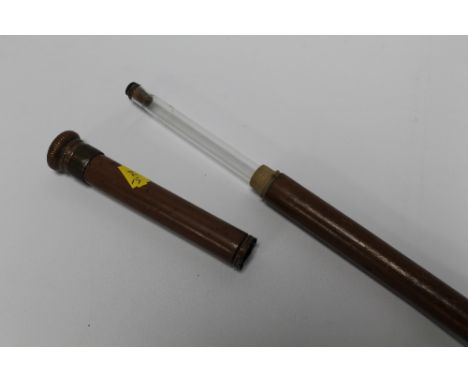 A BEECH TIPPLING WALKING CANE with inner glass flask A/F