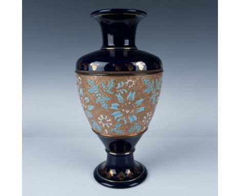 This antique Art Nouveau large vase features a tapestry design with a glossy cobalt top and base, accented by gold fleur-de-l