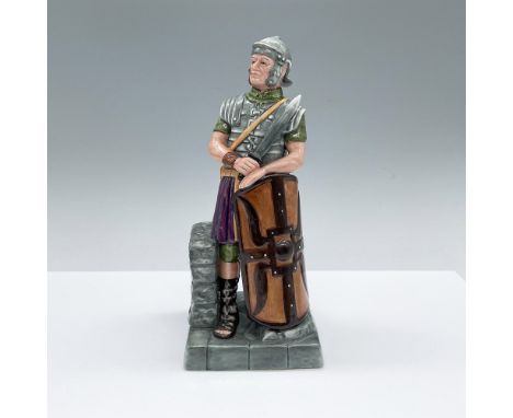 Hand decorated figure of a Roman soldier holding a sword and shield. Grey and purple coloration. Royal Doulton backstamp. Art