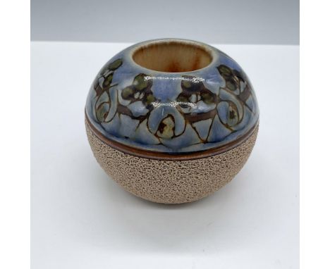 Glazed in a blue patterned design with a textured lower part that functions to light up matches. Eliza Simmance mark, Harriet