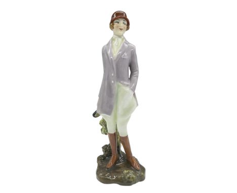 Art decor style figure of a lady in a hunting attire. Royal Doulton backstamp. Artist: Leslie HarradineIssued: 1926 - 1938Dim