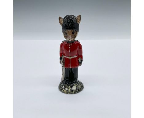 Had decorated porcelain figure of a bunny dressed as a King's Guard. Scarlet-red jacket with white buttons, black trousers an