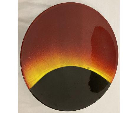 A large limited edition hand painted "Eclipse" charger by Poole Pottery. Initials CL to back.  Approx. 41cm diameter.