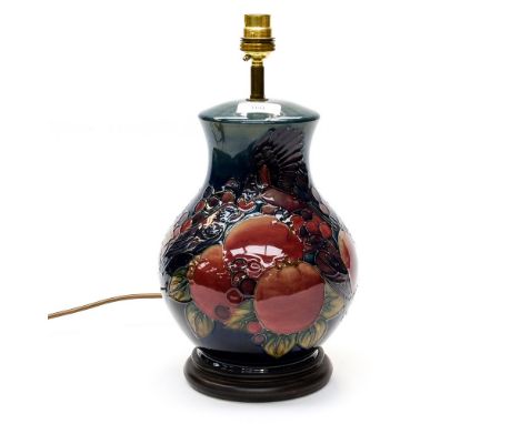 A modern Moorcroft Pomegranate lamp base, baluster form with birds amongst fruit, 35cm high including fittingPlease note: thi