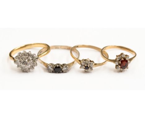 Four rings, on 9ct gold and silver, various white stones, garnet and sapphire sizes P, S½, K½ (4)