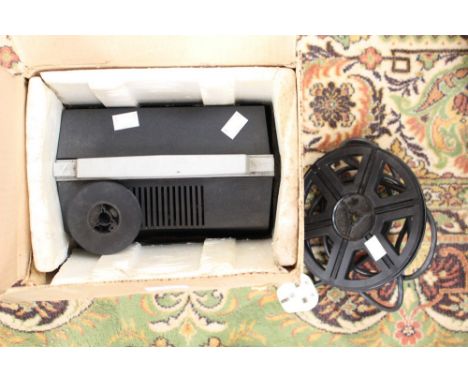 A Tower Super 8 Autozoom cine projector, with original box, instructions, with reels, hardly used 