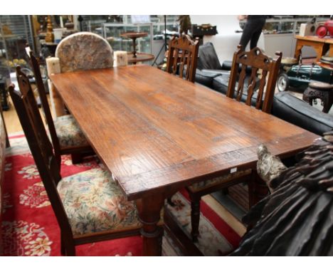 A reproduction refectory table with original chairs, with tapestry covers (set of four) 